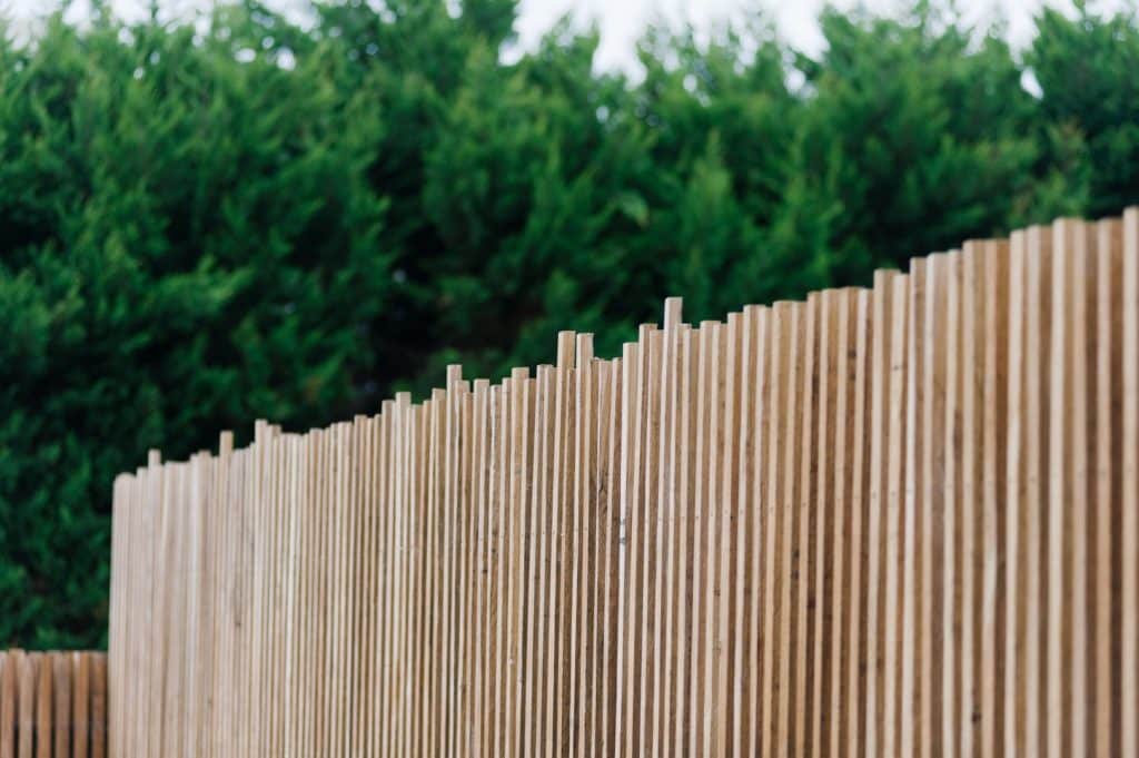 a custom made vertical pole wooden fence for house in mornington peninsula