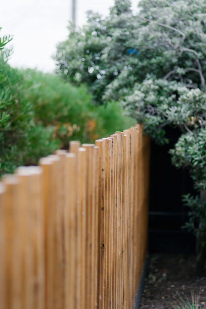 small custom side fence in garden of morington peninsula house