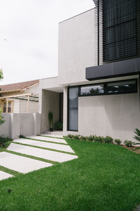 a custom residential landscape leading to front of house in melbourne