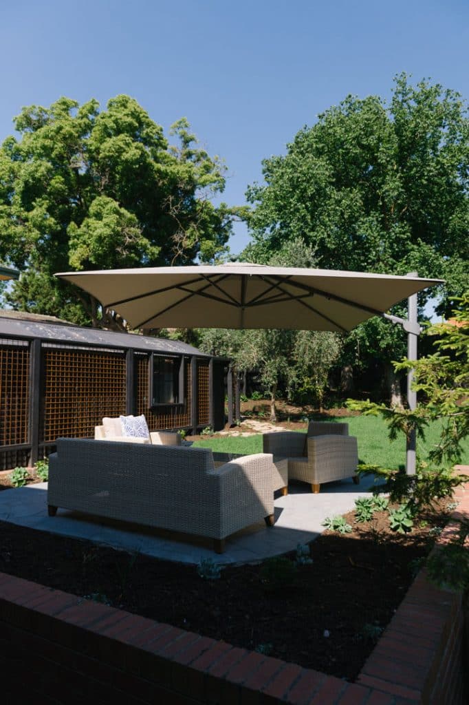large umbrella covering a premium outdoor patio in balwyn
