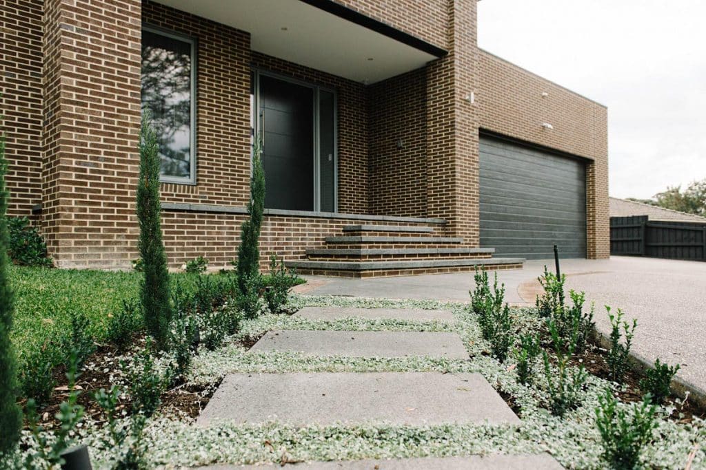 pavers leading through a custom exterior garden landscaped in melbourne