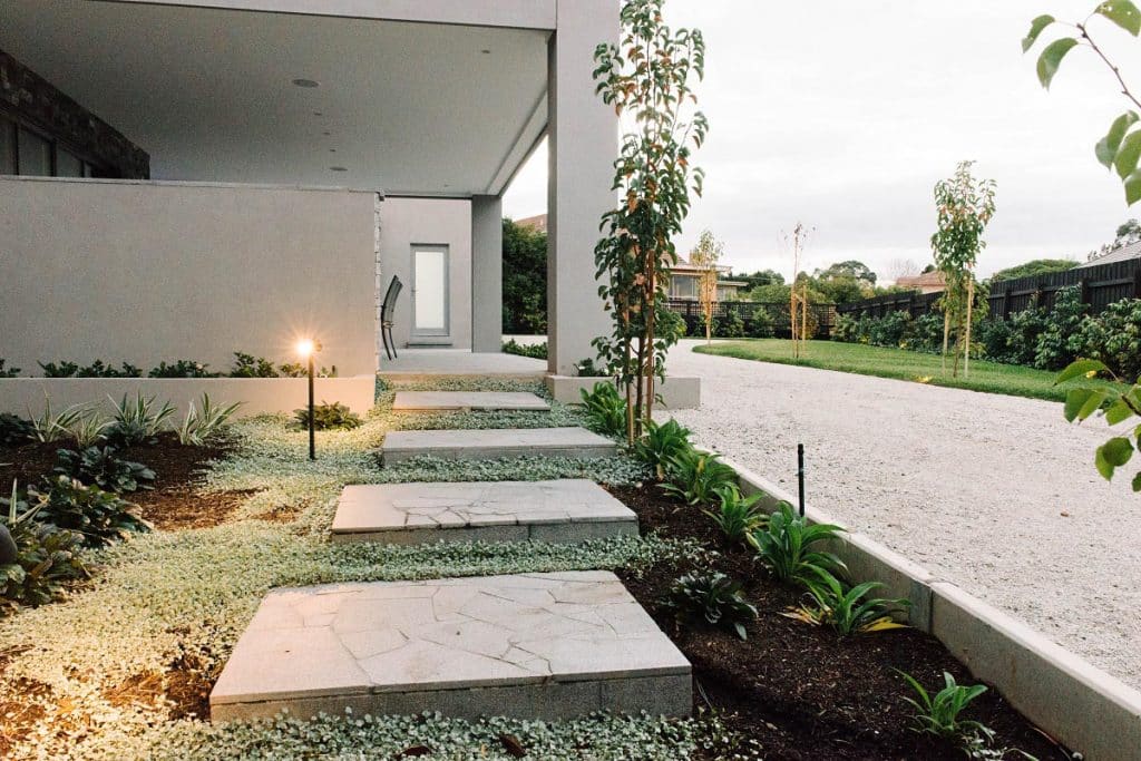 marble pavers leading to a custom landscape entrance in melbourne